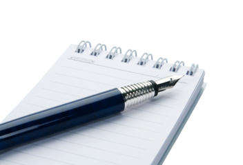 Pen on notebook, isolated on white background.