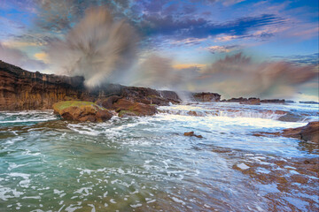 Big waves hit the reef wall