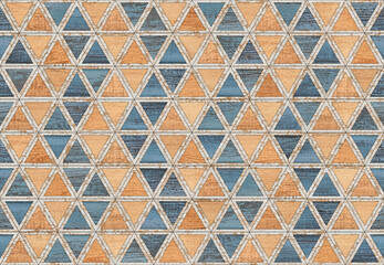 Seamless background with wood texture and repeat triangular pattern. Colorful wooden wallpaper.