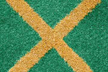 yellow markings on the green football field. football game concept. emerald fleecy texture