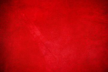 Velvet texture of seamless leather. Felt material macro. Red suede texture. Fabric, leather