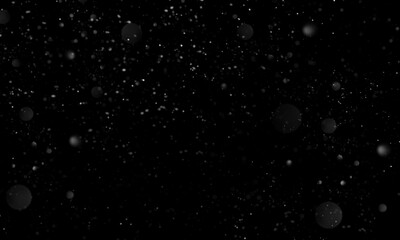 Abstract real dust particle flow in the air on black background