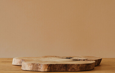 Wooden slice on wooden table and copy space
