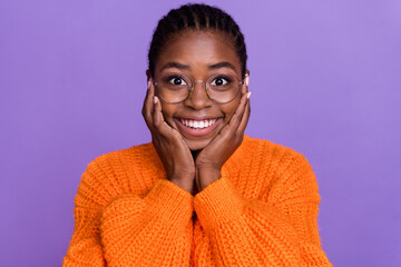 Portrait of pretty cheerful person arms on cheeks toothy smile isolated on purple color background