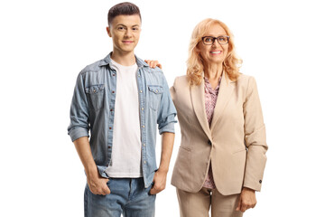 Cheerful mother and son posing and smiling at camera