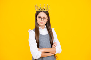 Portrait of ambitious teenage girl with crown, feeling princess, confidence. Child princess crown...