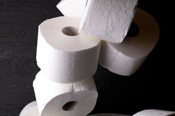 white toilet paper on a black background