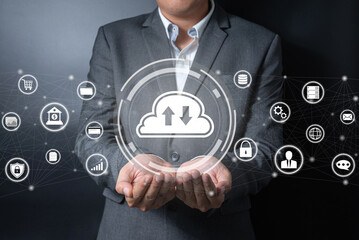 Double exposure of close up businessman holding cloud icon on balck and gray background