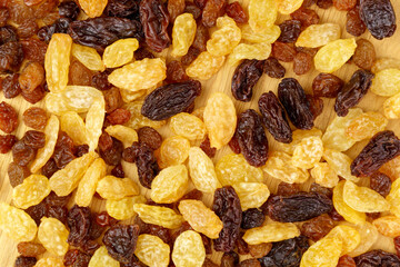 Different types of dried raisins close-up. Snacks from dried fruits. Selective focus