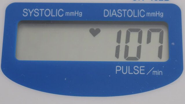Slightly high blood pressure of 140, 85 on a digital sphygmomanometer screen, lifelong illnesses, large expenses for health services and medical insurance. Heart disease concept