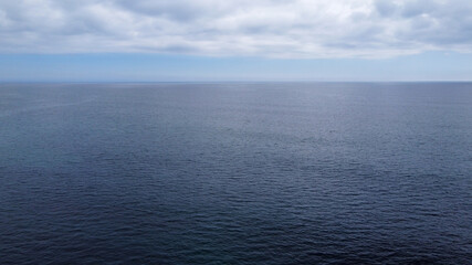 Huge expanses of water and the sky above them. Calm water surface, photos from the air.