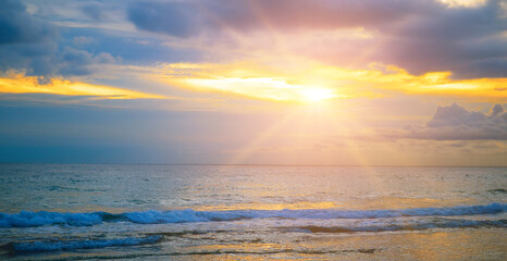 Naklejka na ściany i meble Sunrise over the sea background.