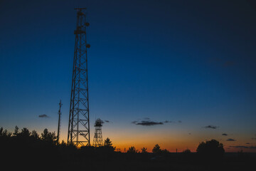silhouette of the radio electricity antenna, beautiful sunset 5G, wifi, neutral background, tower