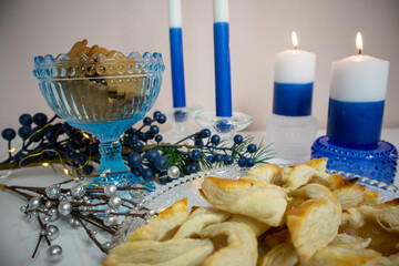 candles and decorations, blues and whites, holiday feeling.
