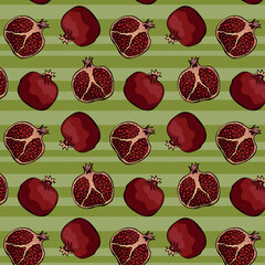 seamless pattern pomegranate  on green striped background