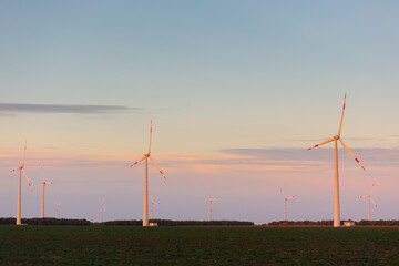 Wind turbines Energy production using clean and renewable energy sources, agricultural fields. a place for text, engineering and lectures without an eco trace. ecology