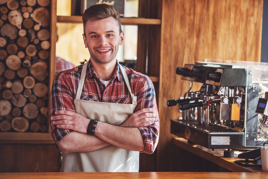 Handsome barista at cafe