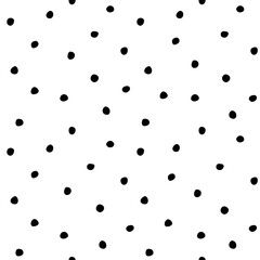 Free hand drawn speckles, flecks, stains or dots of different size seamless pattern. Unusual polka dot black on white abstract monochrome background. Uneven specks, spots, blobs, splashes texture.