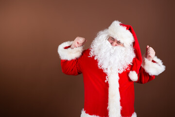 Luck. Lucky Santa Claus poses in the studio. Winning the quiz.