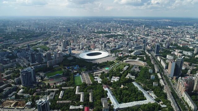 Olympic Stadium. Kyiv. Ukraine. City center. Football field. Contemporary design. Aerial photography. Tribunes.  Places for fans.