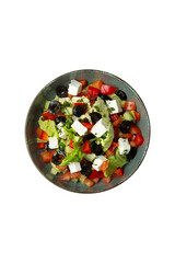 Greek salad. Vegetables and feta cheese. in a plate. View from above. Transparent.