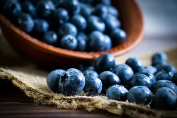 Fresh blueberries on old background