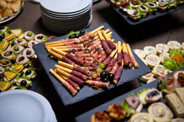 Cattering. Table full of food.