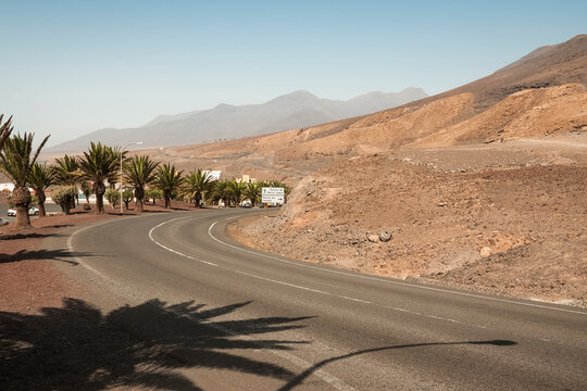 in the photo we can see the road that leads to the south of fuerteventura, mooro jable. in detail there are plants and dunes