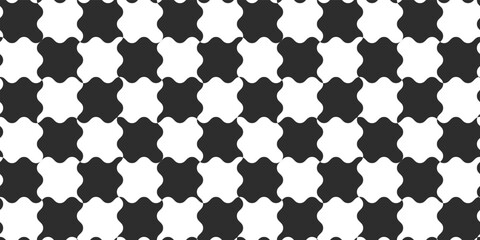 Wavy chess cells. Vector puzzle of simple shapeless shapes. Checkered and black and white seamless print for various surfaces.