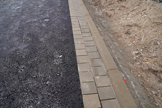 Construction road and curb in residential area