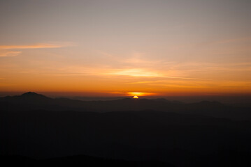View on mountains by the lights of sunset