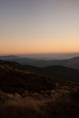 View on mountains by the lights of sunset