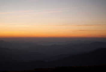 View on mountains by the lights of sunset