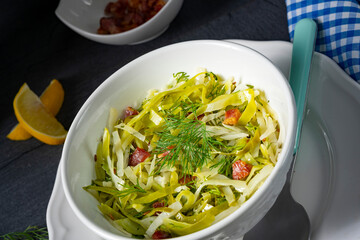 White cabbage with dill and diced bacon