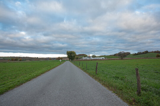 Country road through the fields in Amish country on a cloudy day | Holmes County, Ohio