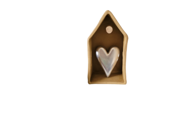 heart inside a clay house in PNG