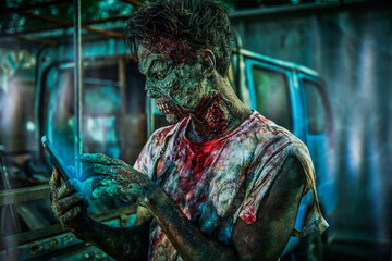 Fototapeta na wymiar zombie with smartphone