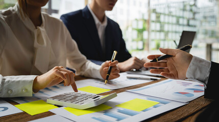 Teamwork with business people consultant describes a marketing plan to set business strategies. business budget planning and business research concept, Negotiation, Analysis, Discussion