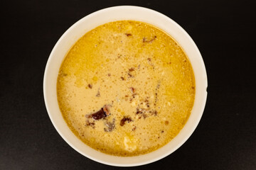 Cheese Burger Soup with ground beef cheese and a white bowl