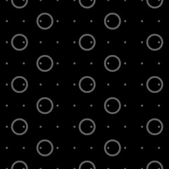Vector illustration. Geometric seamless pattern. Solid dots and linear circles in rows. Spotted grey, black and white background. Simple monochrome abstract pattern.