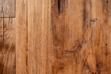 Naklejka premium Old wooden background with cracks. Structure of an old wood close up. Brown colored texture natural wood