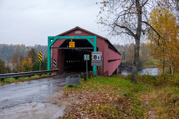 Traditional covered bridge built in 1931 and known as the Savoyard bridge. Located in Grand-Remous Quebec, Canada, it spans the Gatineau River.