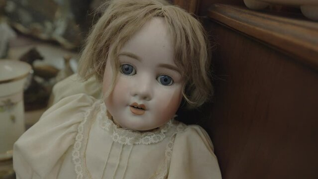 Zoom in on creepy vintage baby girl toy doll / St. George, Utah, United States