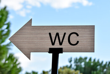 Toilet signboard in a park