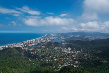 Fototapeta na wymiar aerial view of the sea and mountains, city on coast