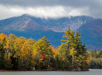 Baxter Peak view surrounded by moody clouds from Lake Katahdin, Maine, in early fall
