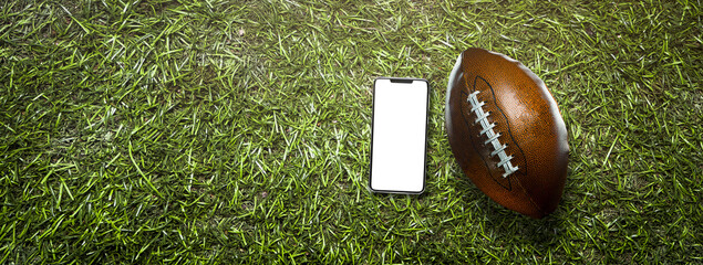 smartphone and american football ball on the grass of a stadium - png transparent