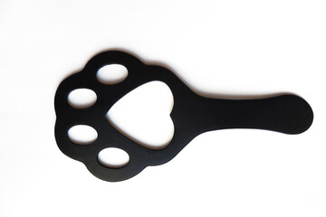 Sex toys. BDSM. Slap for ass. in the shape of a paw. The concept of pain and pleasure. Insulated on...