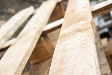 Wooden pallets in perspective. An interesting view of a pallet made of wood.