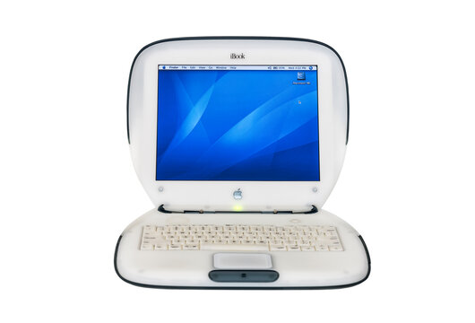 Los Angeles, California, USA - November 6, 2019:  Illustrative editorial isolated photo of old working Apple clamshell style iBook laptop computer which was manufactured in the year 2000. 